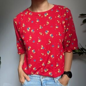 Bright floral patterned knit shirt